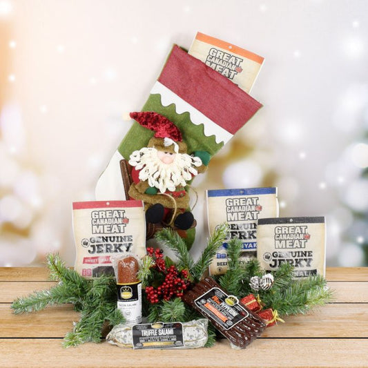 Christmas Cured Meat Gift Set - Featured in this gift set is a wide selection of cured meats for the certified carnivore in your life! There are Great Canadian Meat jerkies, truffle salami from Wagener’s, pepperoni sticks, bacon salami, and a Santa themed stocking